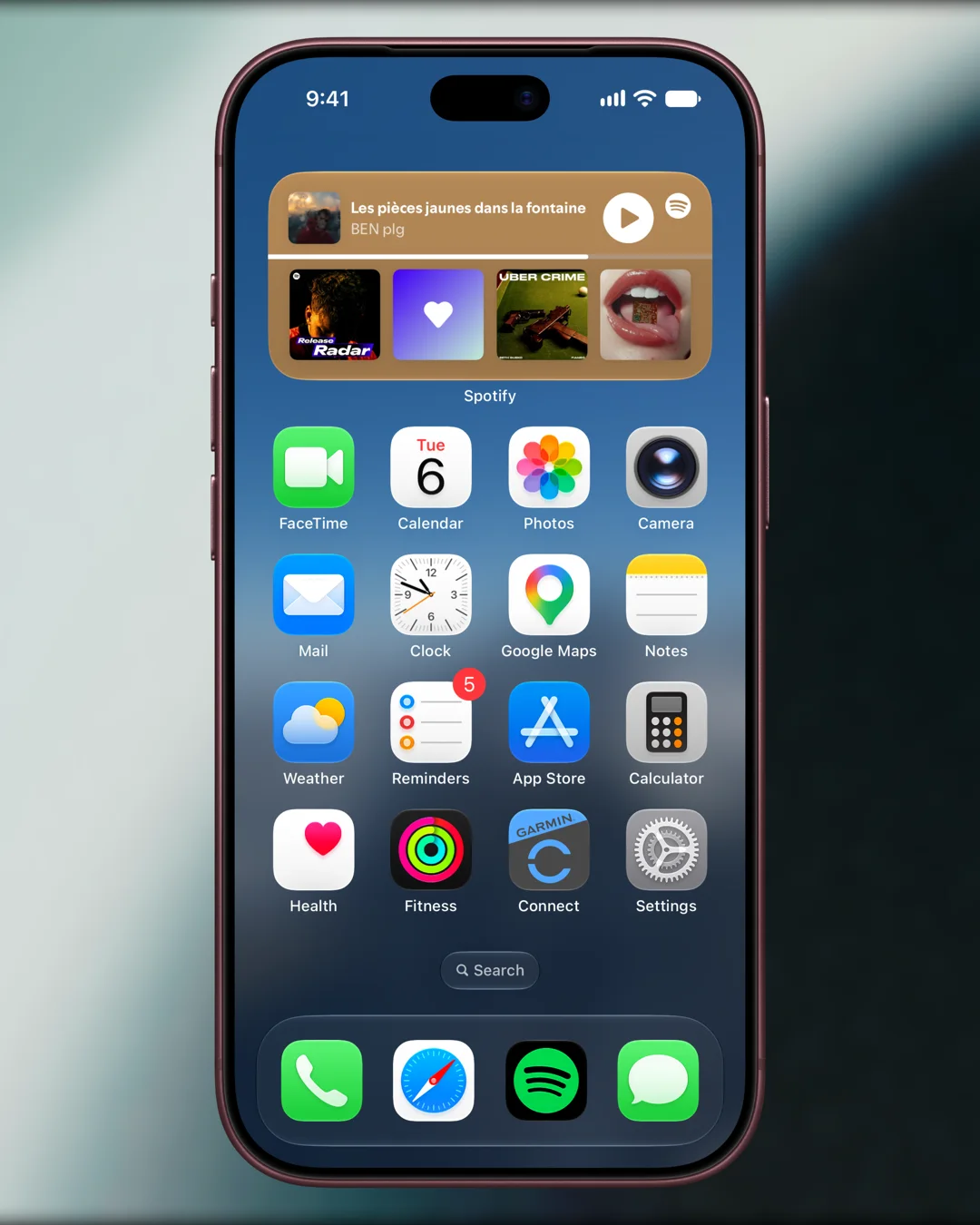 A flat Burgundy iPhone 18 Pro bezel on a softly blurred dark background, in a 4:5 frame